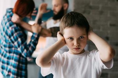 Kid covering his face